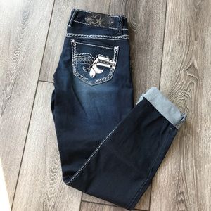 Full length skinny jeans.